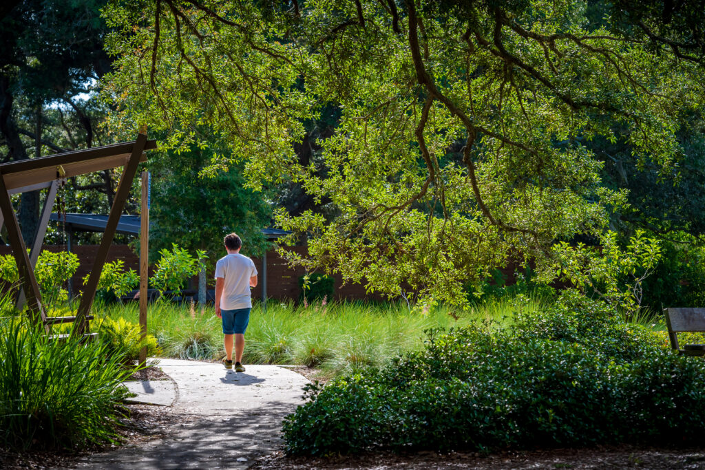 Vegetation and sidewalk at Innerarity Point Park