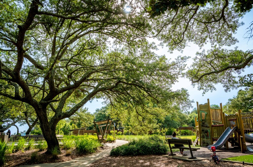 Playground and sidewalk at Innerarity Point Park