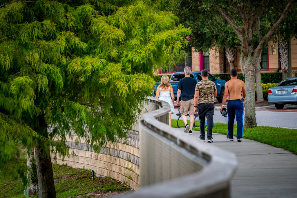 People walking through Oviedo on the Park