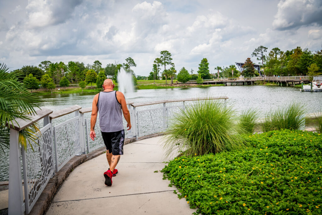 Resident walking along Center Lake